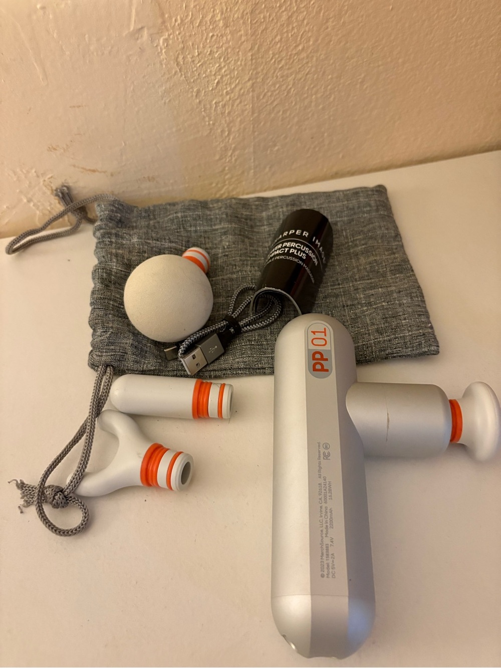 Sharper Image Silver and Orange Mini Percussion Massage Gun